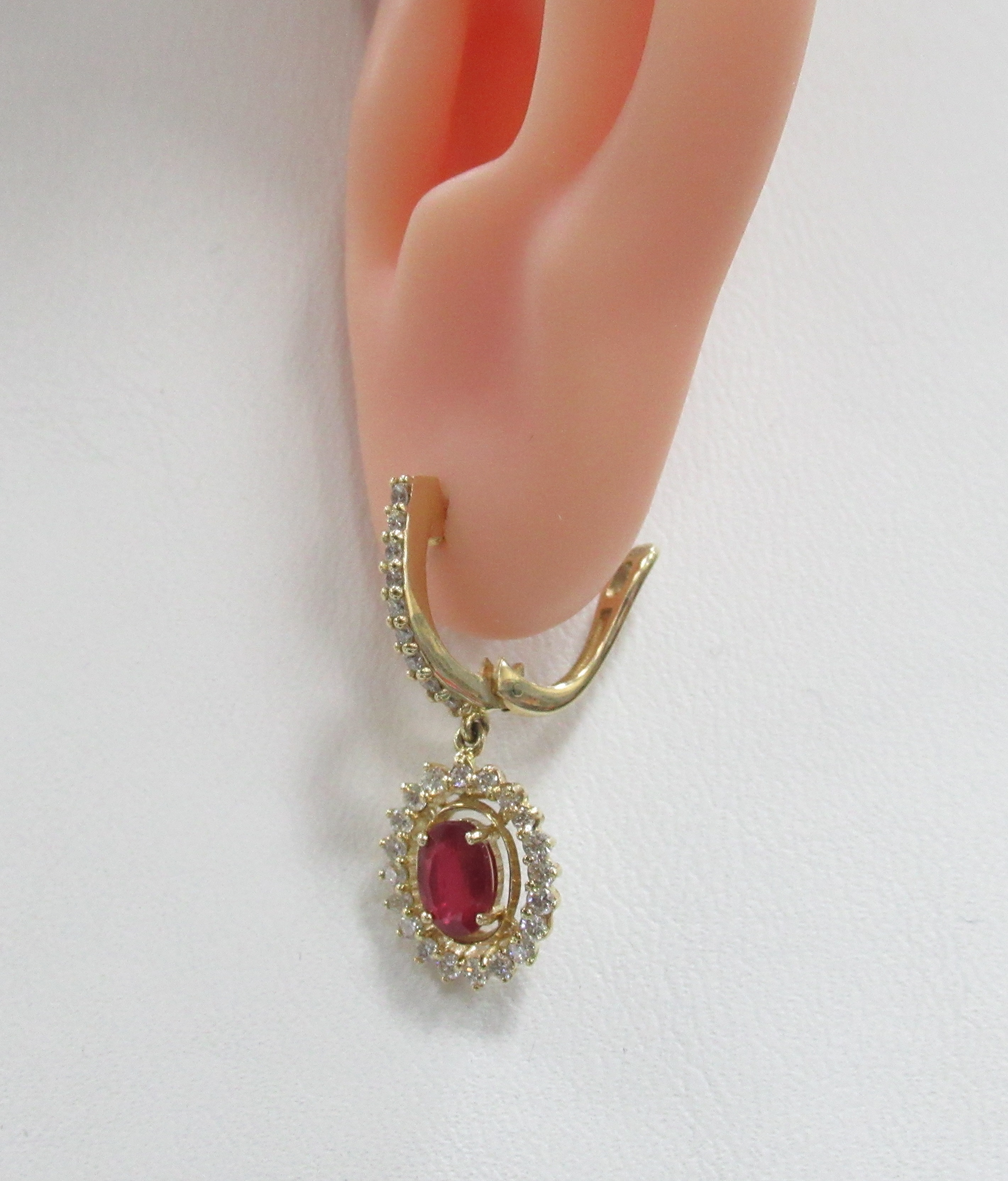 Серьги из желтого золота с рубинами